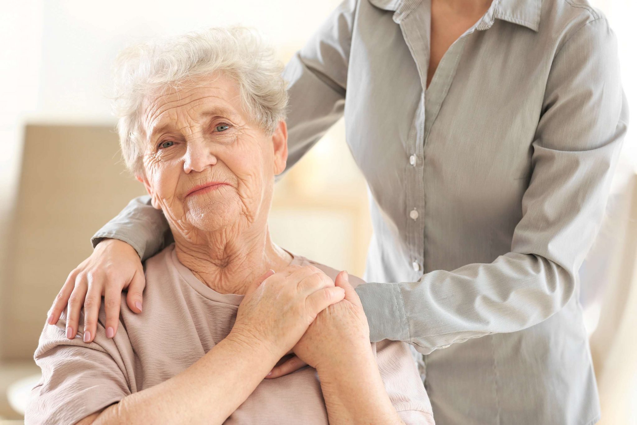Senior confidently living alone with Red Dot Alerts