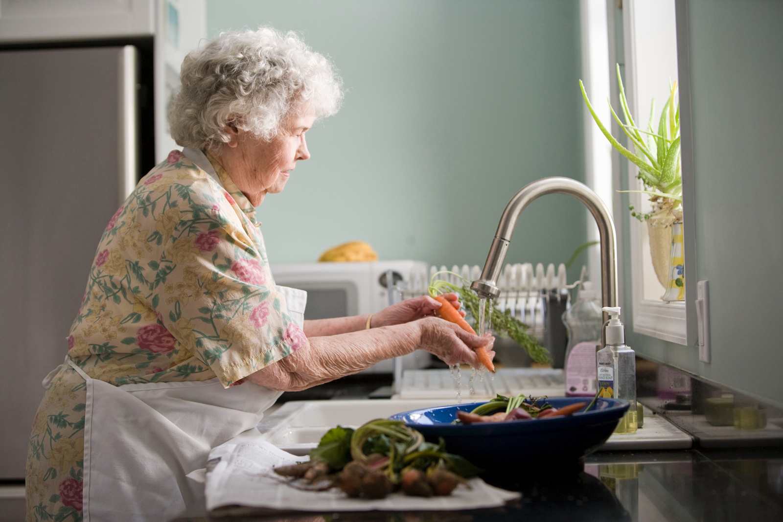 Senior enjoying independent living with emergency monitoring