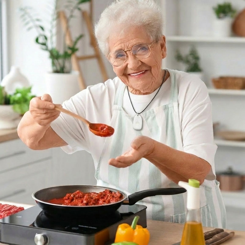 Senior woman in the kitchen being carefree thanks to Senior Protection