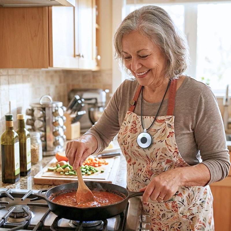 Senior woman in the kitchen being carefree thanks to Senior Protection